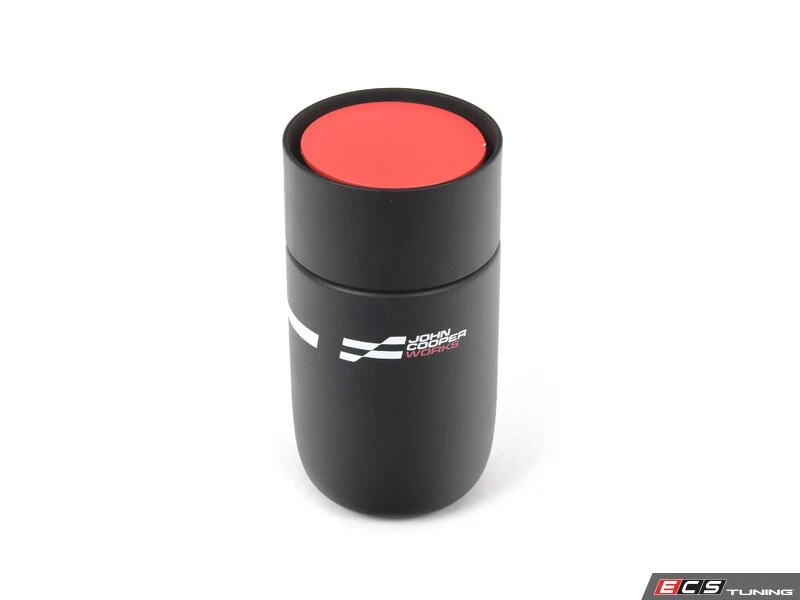 Taza de viaje MINI JCW negra/roja (300 ml) con tapa botón press-to-drink OEM 80285B54F35. Original MINI.