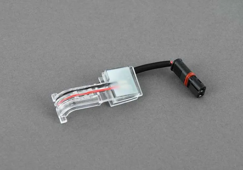 Iluminación del asidero puerta delantera derecha OEM 63177277448 para BMW F20, F21, F22, F30, F32, F36 y más. Original BMW.
